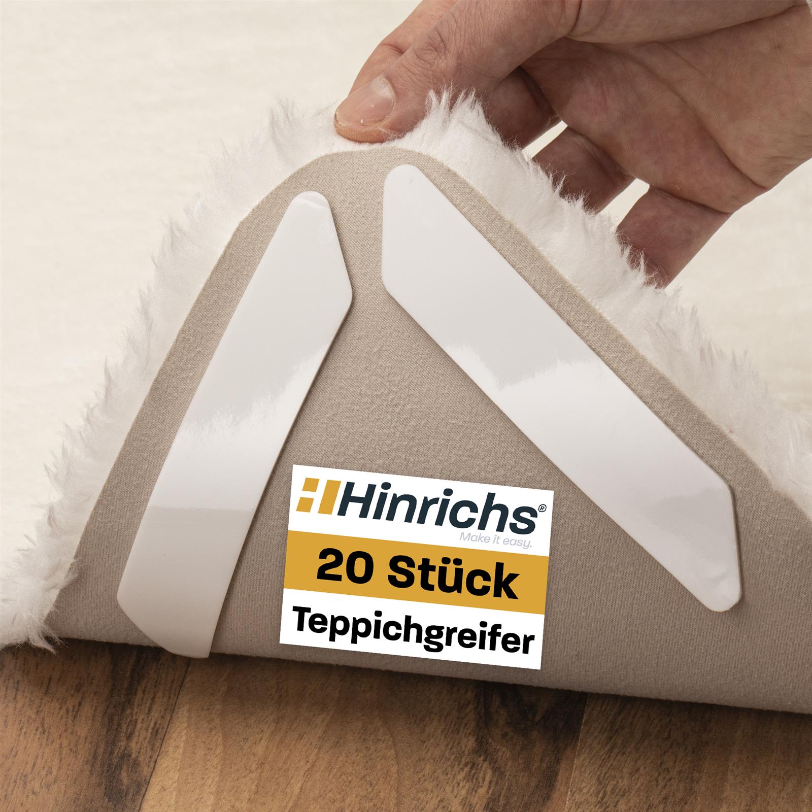 Teppichgreifer aus Metall mit ergonomischem Griff – Rutschfeste Teppichfixierung für sicheres Verlegen Teppich-Greifer mit Metallzähnen und schwarzem Kunststoffgriff, auf weißem Hintergrund liegend.